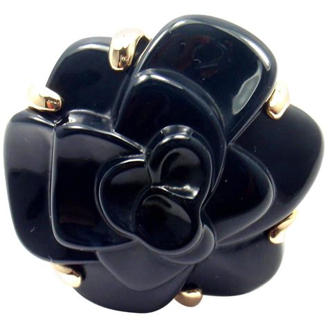 chanel camelia ring onyx|Chanel camellia flower earrings.